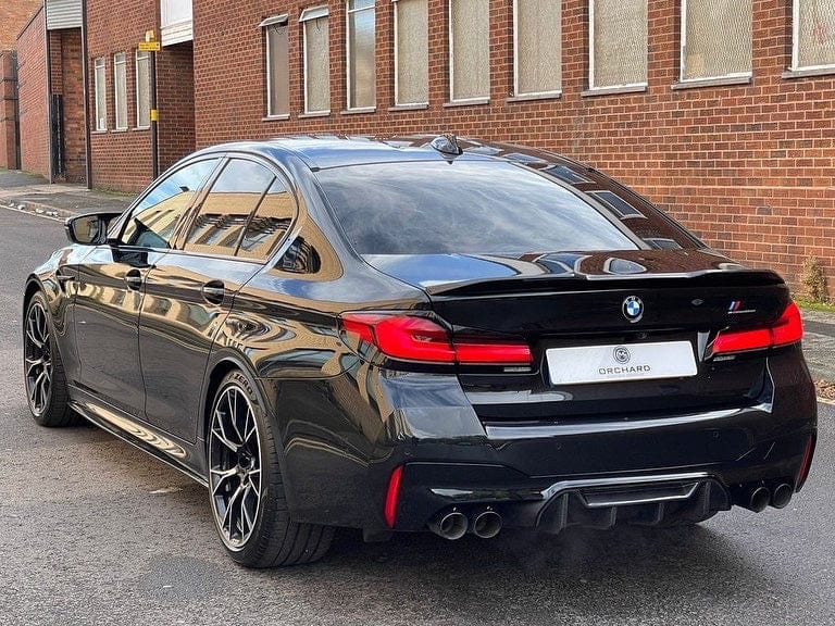 BMW F90 M5 LCI saloon with CT Carbon full carbon fiber kit, showcasing V6 style components on the full car.