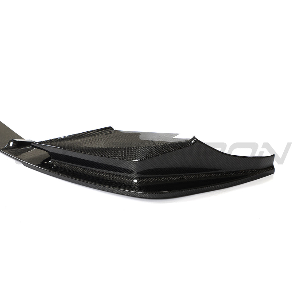 BMW F90 M5 and M5C LCI carbon fiber splitter by CT Carbon, showcasing a 3D style aerodynamic front splitter.