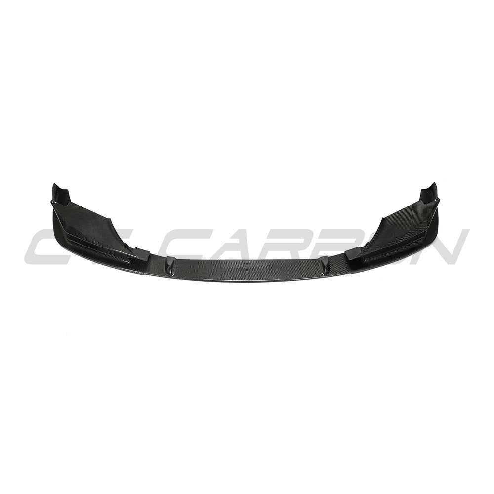 BMW F90 M5 and M5C LCI carbon fiber splitter by CT Carbon, showcasing the V4 3D style with detailed carbon fiber texture.
