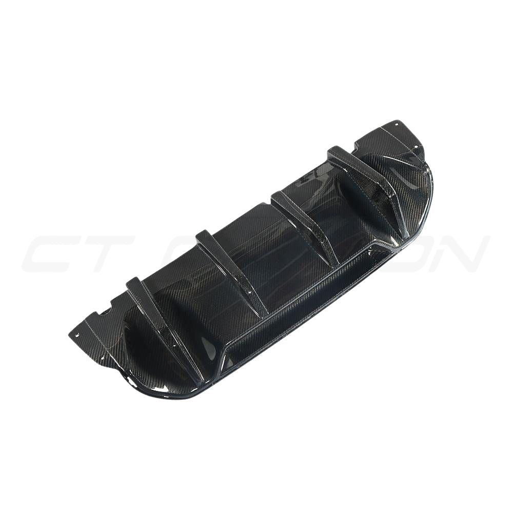 BMW F90 M5 saloon full carbon fiber kit by CT Carbon, featuring V4 design with front, side, and rear carbon accessories.