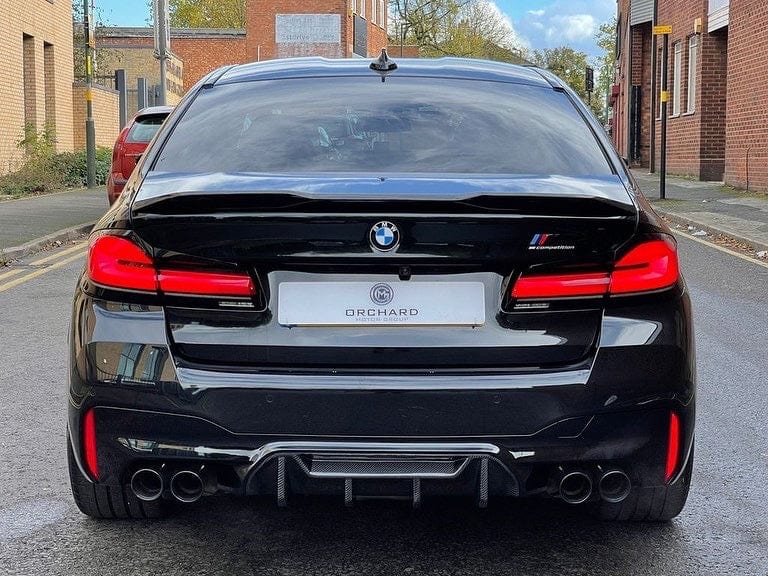 BMW F90 M5 saloon full carbon fibre kit by CT Carbon, featuring V4 style components on the car's exterior.