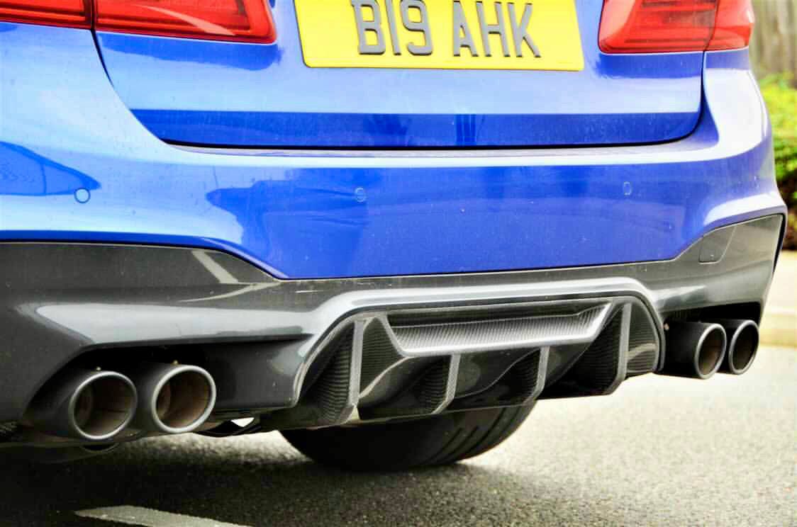 BMW F90 M5 saloon with CT Carbon V4 full carbon fiber kit, featuring sleek, lightweight carbon components on the car's exterior.