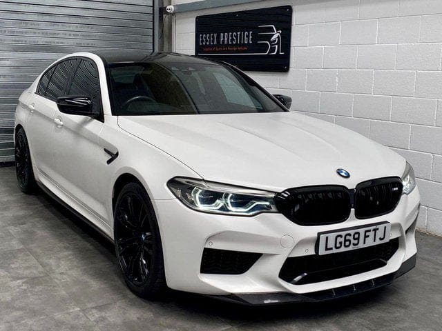 BMW F90 M5 saloon with CT Carbon full carbon fibre kit, including front bumper, side skirts, and rear diffuser.