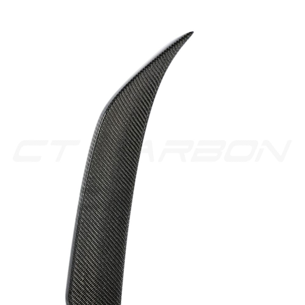 BMW F90 M5 saloon full carbon fibre kit by CT Carbon, featuring V4 lightweight carbon parts on a sleek M5 model.