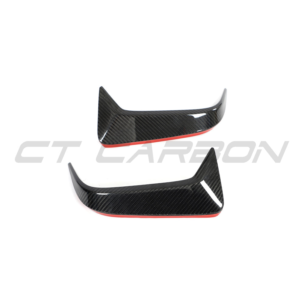 BMW F95 X5M 2019-2022 pre-LCI carbon fibre rear bumper trim by CT Design, shown on the vehicle's rear bumper.