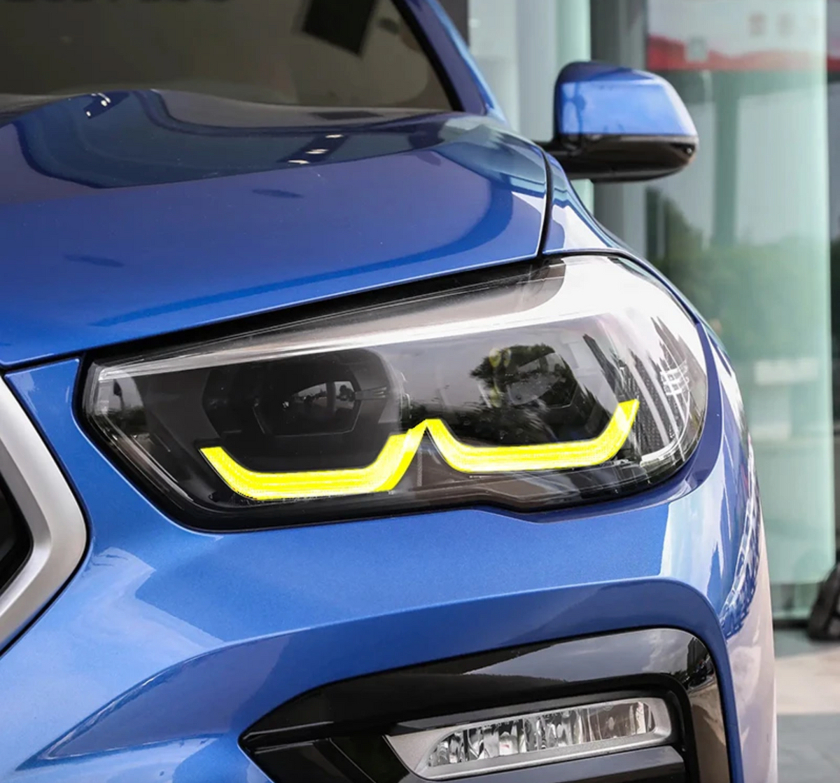 BMW G06 X6 yellow adaptive DRL module set by CT Carbon, automotive accessories for 2019-2022 models, close-up view of the module.