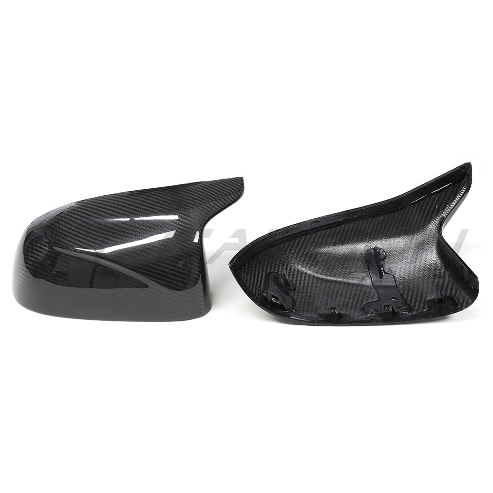 BMW F97 X3M, F98 X4M, F95 X5M, F96 X6M 2019+ carbon fiber mirrors by CT Carbon, showing sleek pre-preg carbon fiber surface.