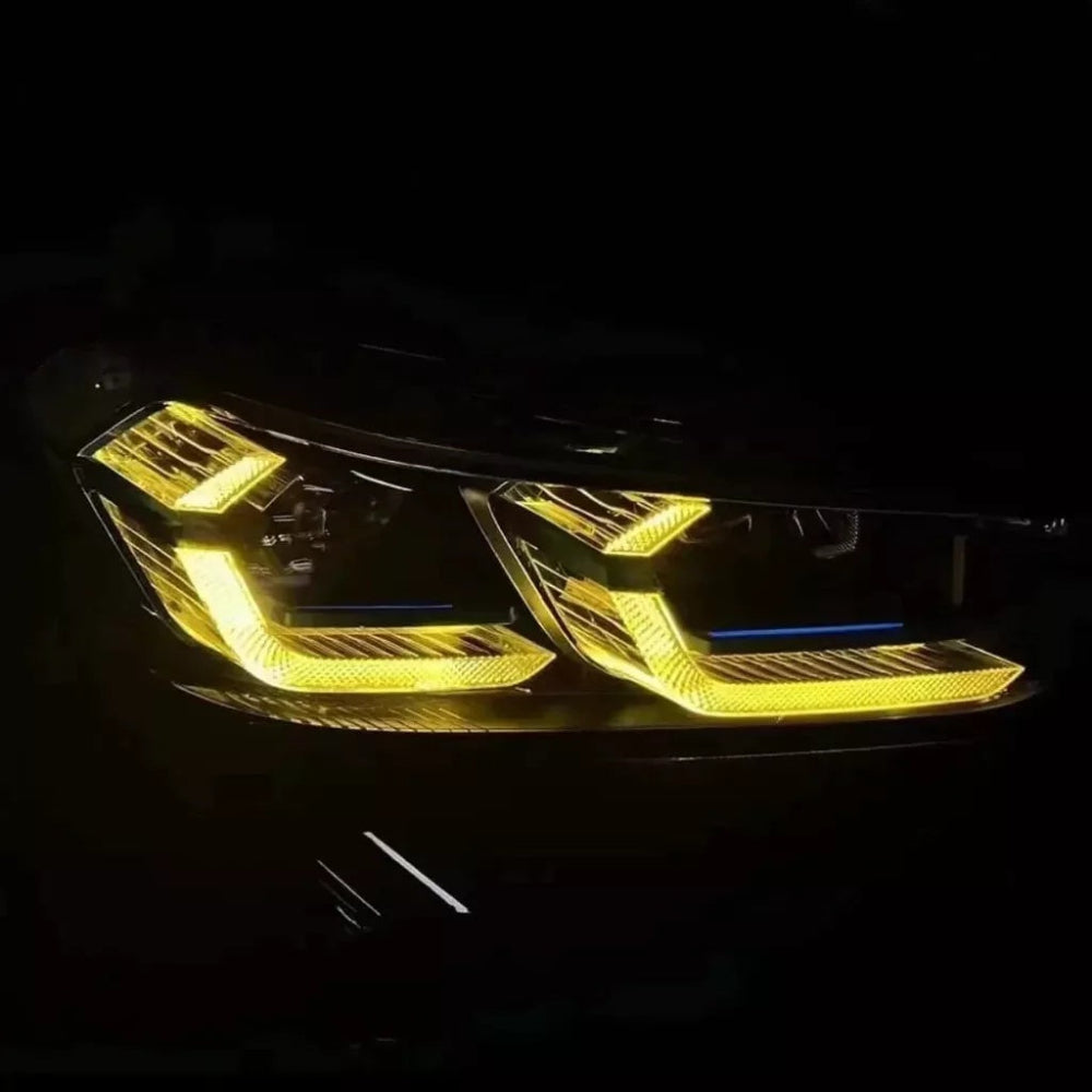 BMW F98 X4M LCI yellow adaptive DRL module set by CT Carbon, featuring bright yellow LED daytime running lights.