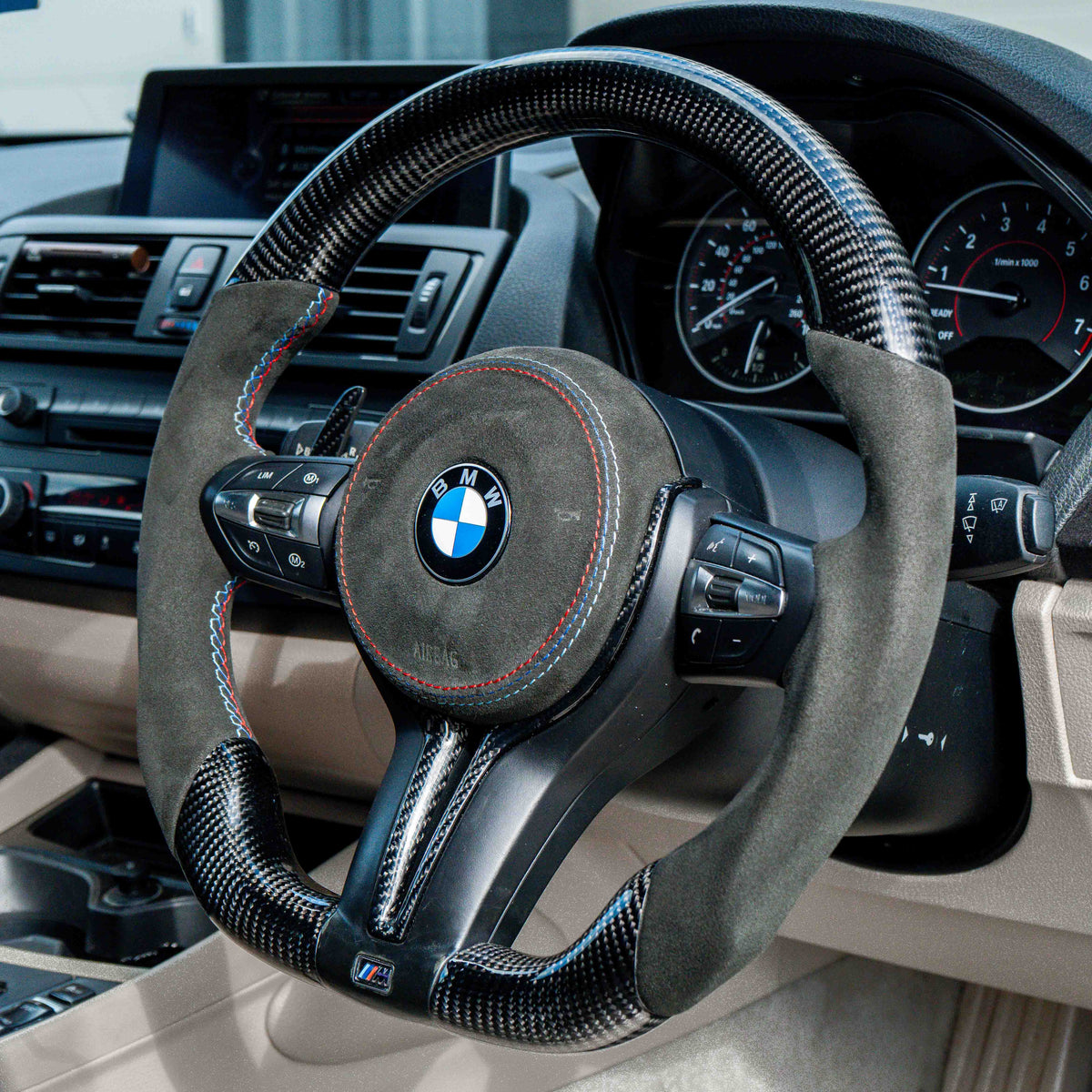BMW Fxx carbon fiber magnetic shifter paddles by CT Carbon, showing sleek black carbon fiber design for Fxx series vehicles.