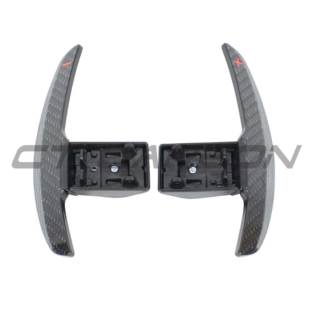 BMW Fxx carbon fiber shifter paddles by CT Carbon, showcasing sleek, lightweight racing-style gear shift paddles for BMW vehicles.