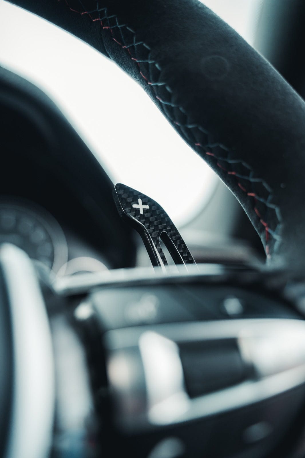 BMW Fxx carbon fiber shifter paddles by CT Carbon, sleek and lightweight accessories for enhanced driving control.