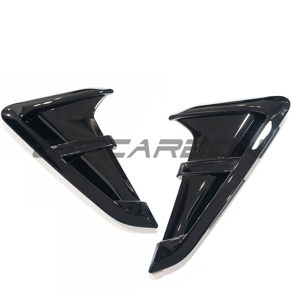 BMW G01 X3 gloss black fender trims from CT Carbon, close-up view of sleek, high-quality automotive accessories.