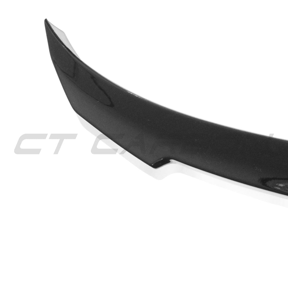 BMW G20 3 Series exhaust kit with gloss black finish and square tips by CT Carbon, installed on a black vehicle.