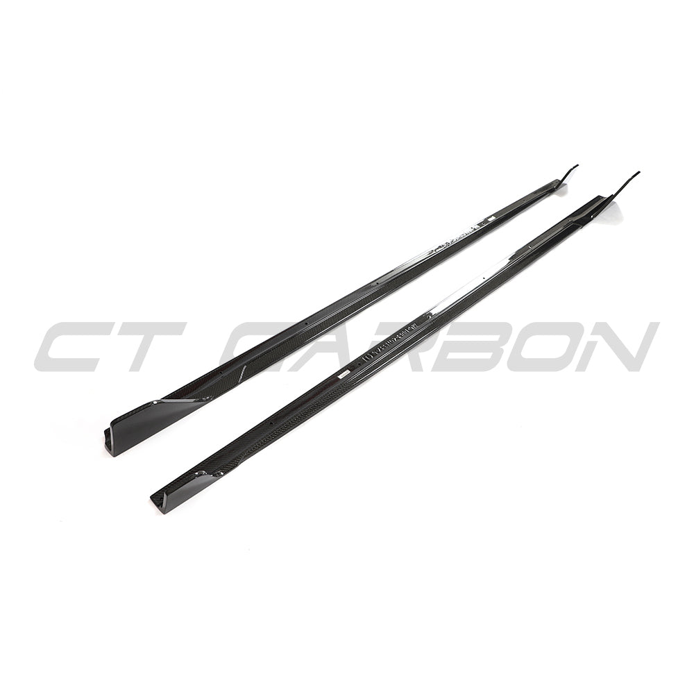 BMW G42 2 Series 2022+ full carbon fibre side skirt kit by CT Carbon, showing sleek, lightweight carbon fibre design on the car.