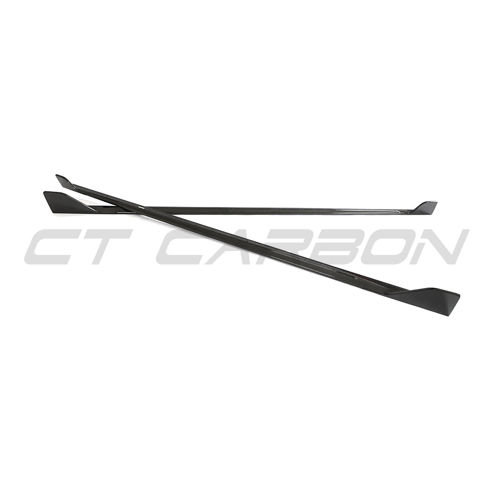 BMW G42 2 Series 2022+ CT Carbon full carbon fibre side skirt kit installed on the vehicle, showcasing sleek, lightweight design.
