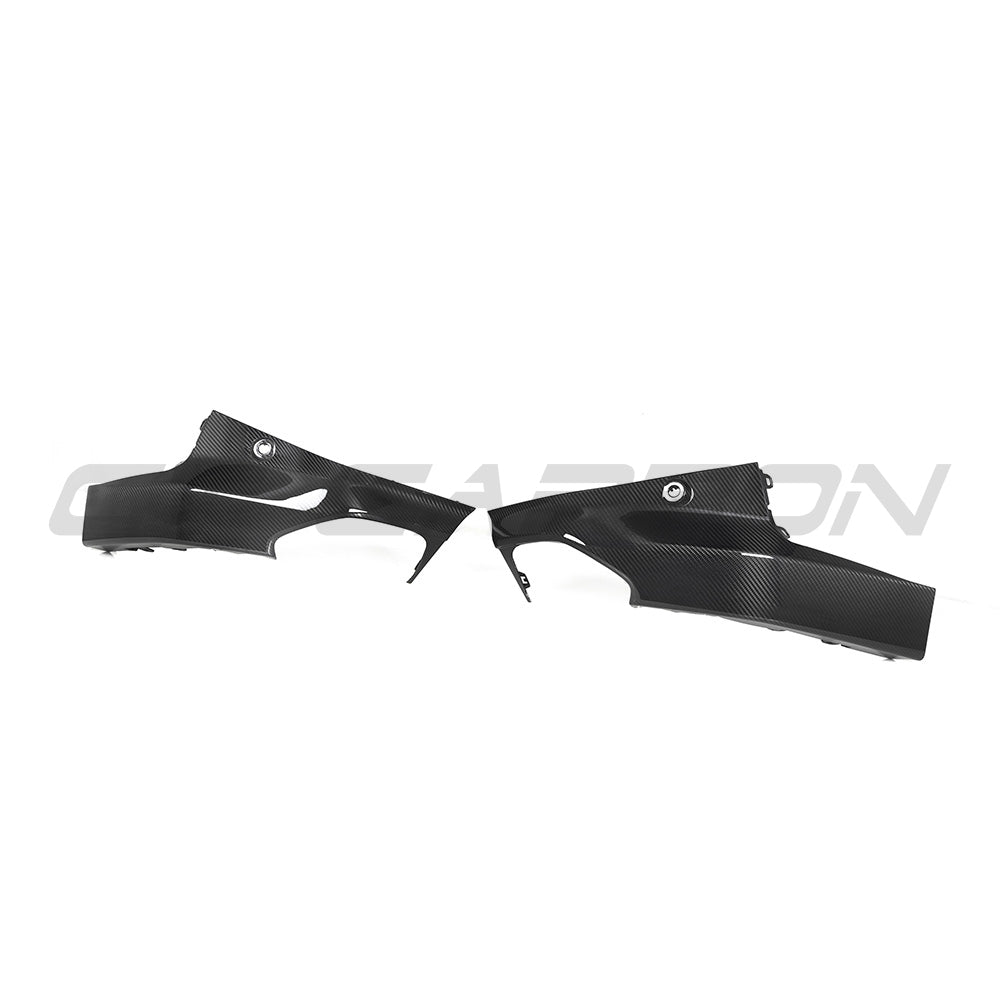 BMW G42 2 Series carbon fiber rear bumper corners accessory by CT Carbon, showcasing sleek, lightweight automotive design details.