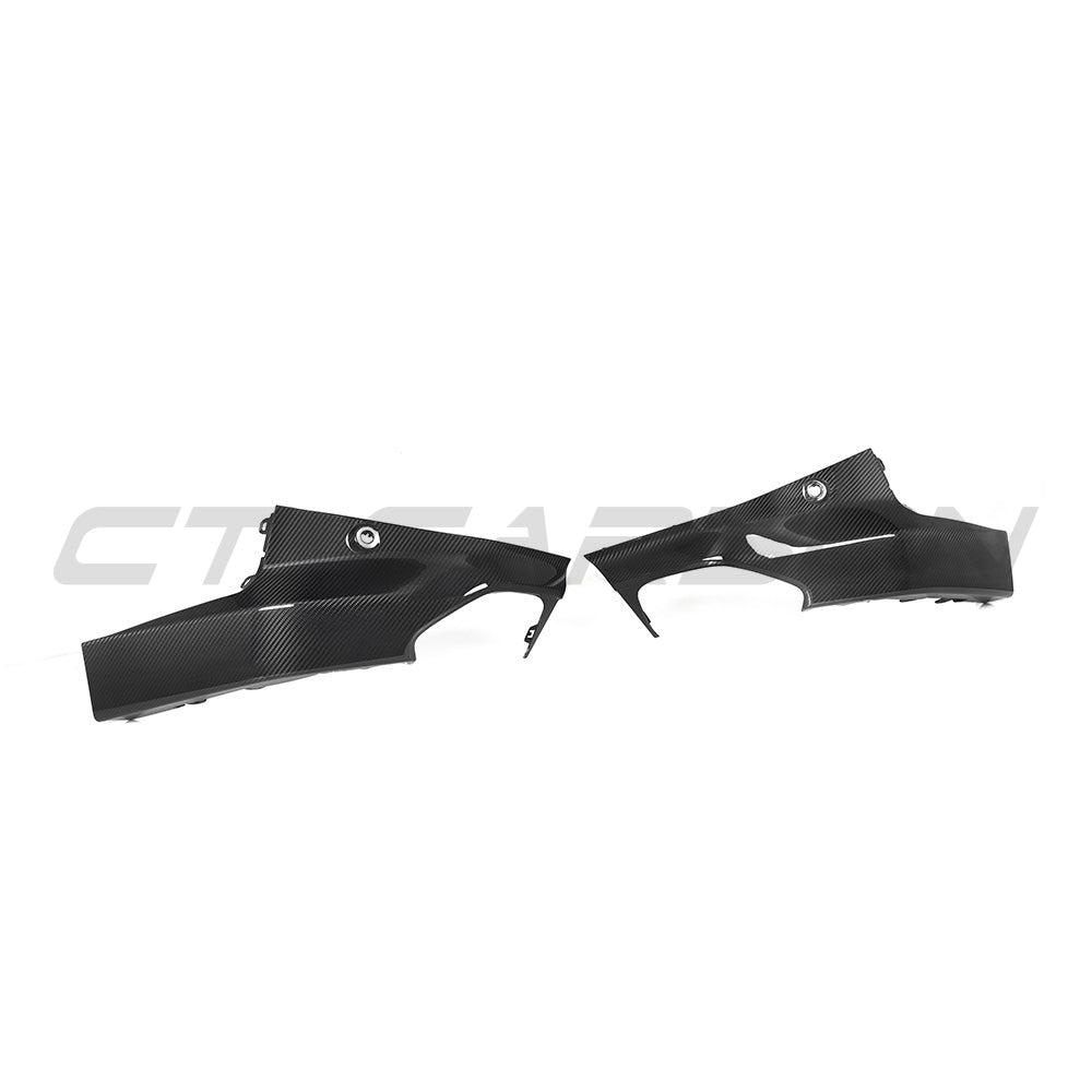 BMW G42 2 Series carbon fiber rear bumper corners by CT Carbon, showcasing sleek, lightweight automotive accessories.