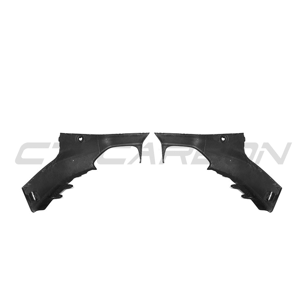 BMW G42 2 Series carbon fiber rear bumper corners, CT Carbon accessories, showing sleek black finish on car's rear.