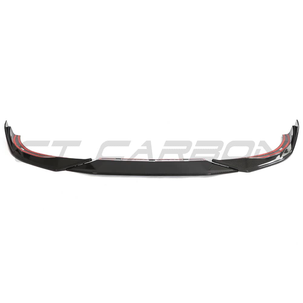 BMW G42 2 Series 2022+ full carbon fiber kit by CT Carbon, featuring a sleek carbon fiber splitter on a sporty car.