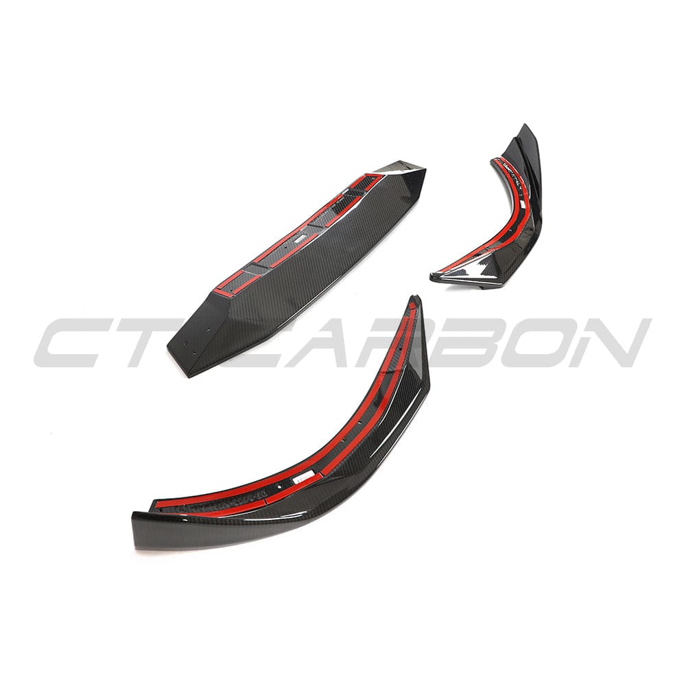 BMW G42 2 Series 2022+ full carbon fiber kit by CT Carbon, featuring a sleek carbon fiber splitter on the sporty car.