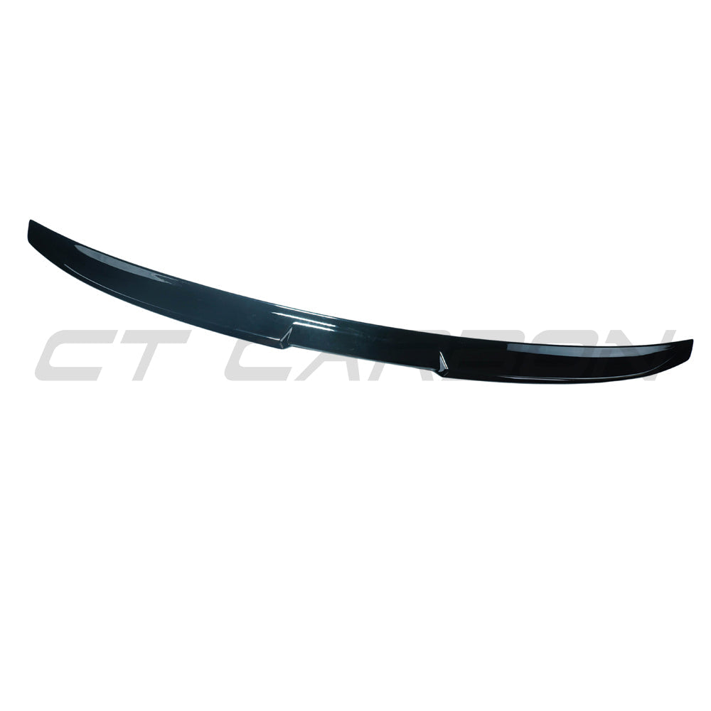 Gloss black spoiler for BMW G60 and i5 5 Series 2023+ by CT Carbon, showing the sleek aerodynamic design of the car accessory.