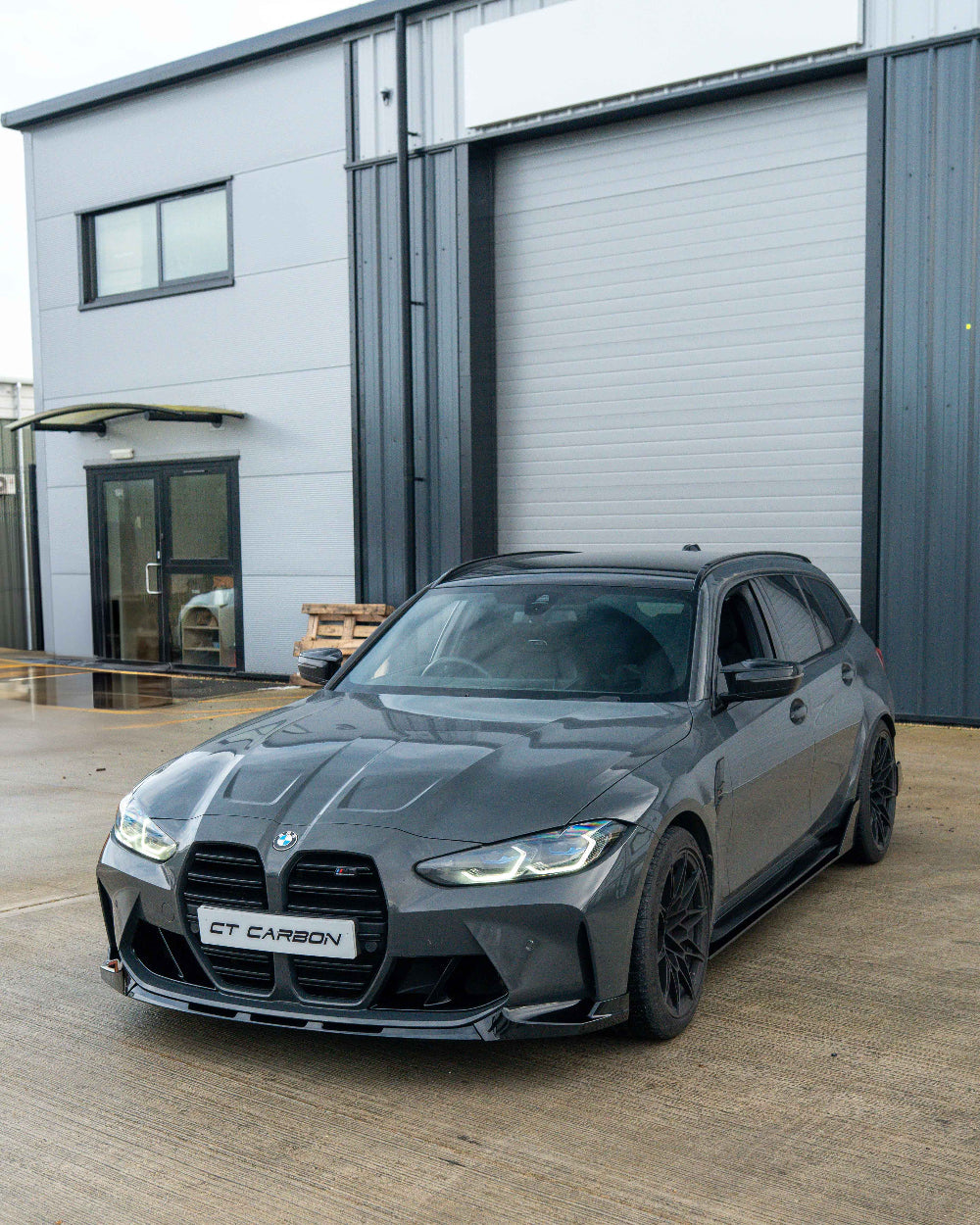 BMW G80 G81 M3 and G82 G83 M4 CT Carbon gloss black duct accessories mounted on front bumper.