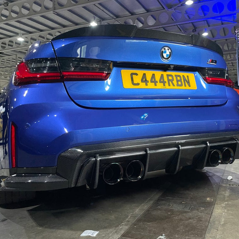 BMW G82 M4 full carbon fiber kit by CT Design, showing the lightweight carbon fiber body parts on a sleek M4 vehicle.