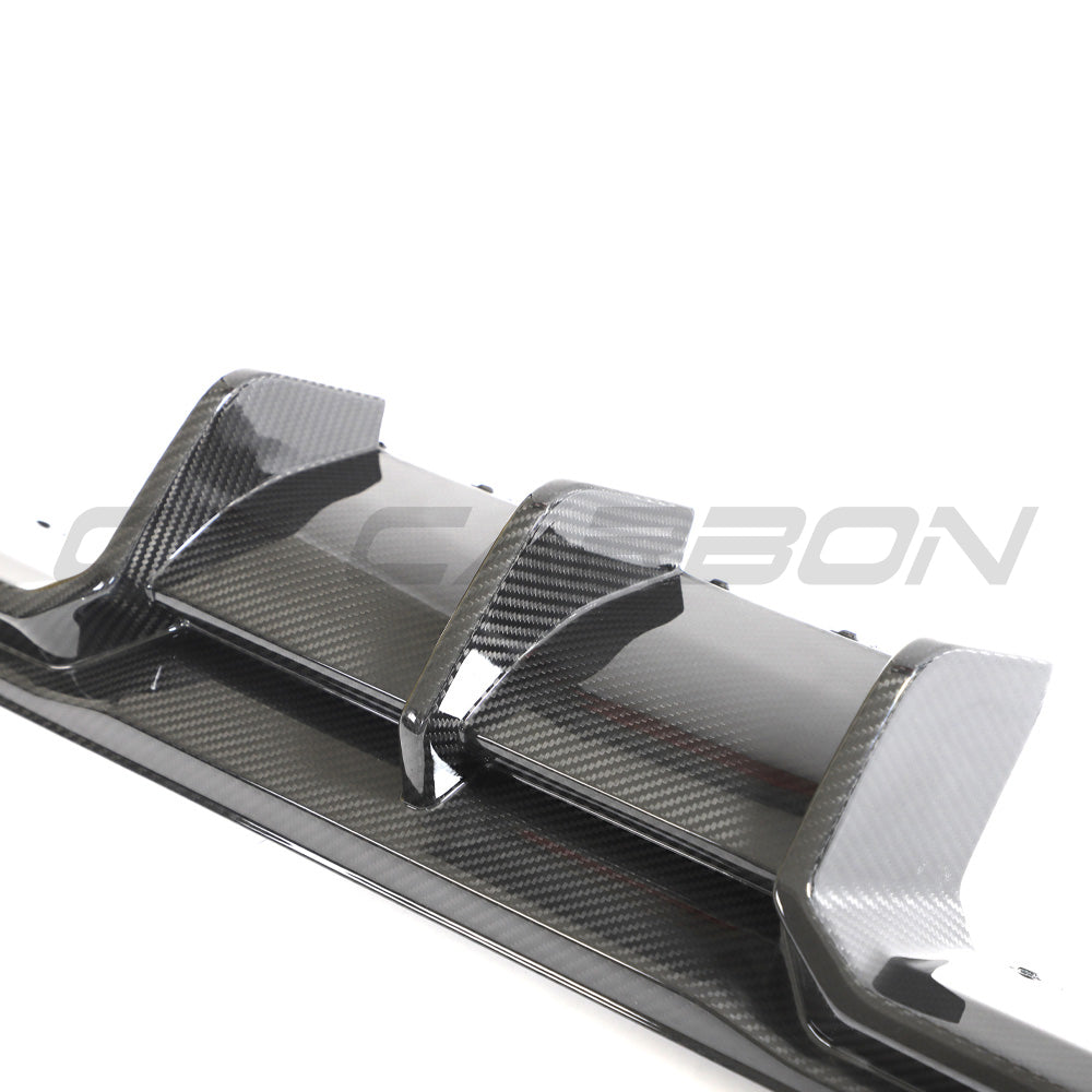 BMW G87 M2 carbon fiber diffuser by CT Design, showcasing sleek black carbon fiber with detailed aerodynamic features.