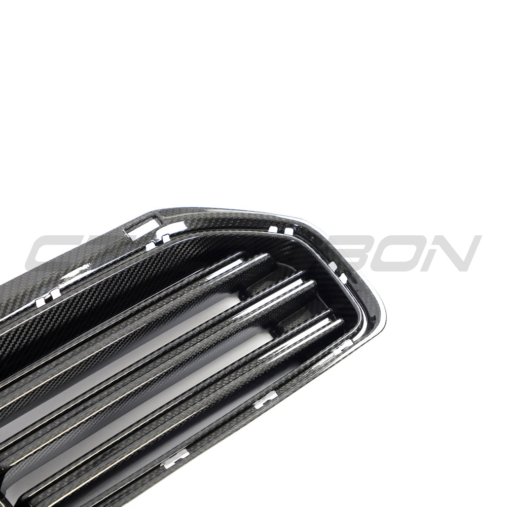 BMW G87 M2 carbon fiber front grille by CT Design, showcasing sleek, lightweight carbon fiber with detailed grille pattern.
