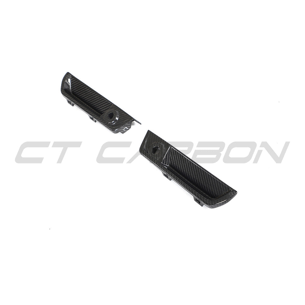 BMW G87 M2 CT Design carbon fiber reflector delete kit, showcasing sleek black carbon fiber parts on the car's exterior.