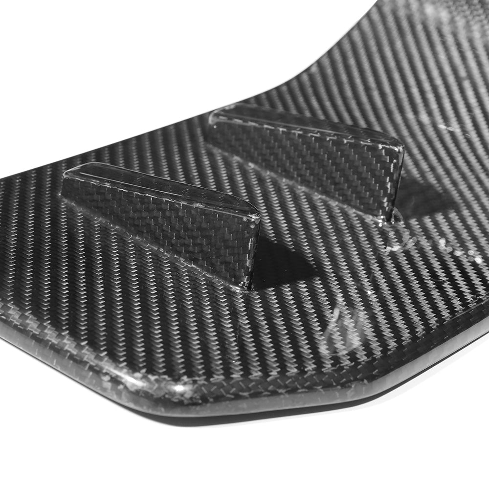 BMW G87 M2 carbon fibre side skirts by CT Carbon, V2 style, shown from a side angle highlighting the sleek design and finish.