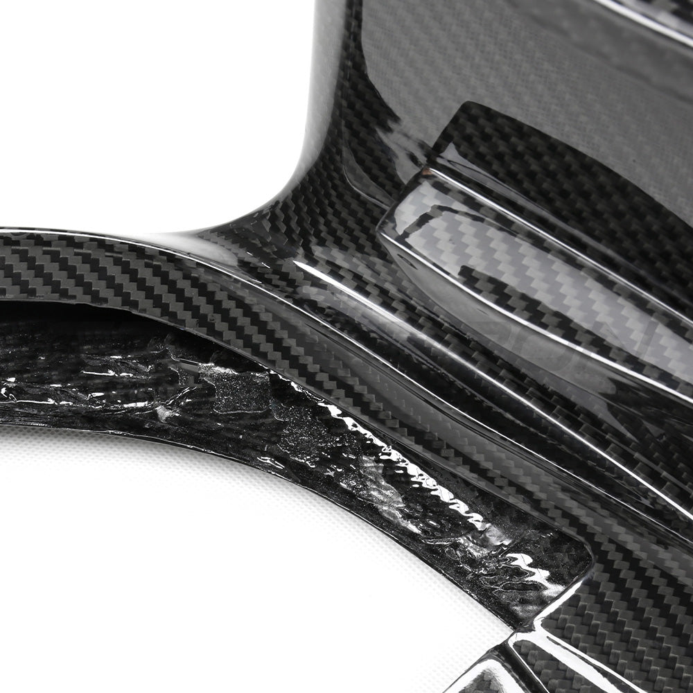 BMW G87 M2 carbon fiber splitter by CT Carbon, V3 model, showcasing sleek, lightweight design and aerodynamic performance.