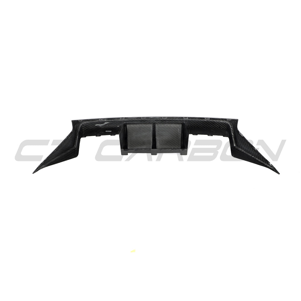 BMW G87 M2 full carbon fiber kit by CT Carbon, showing the sleek, lightweight carbon fiber panels on the car.