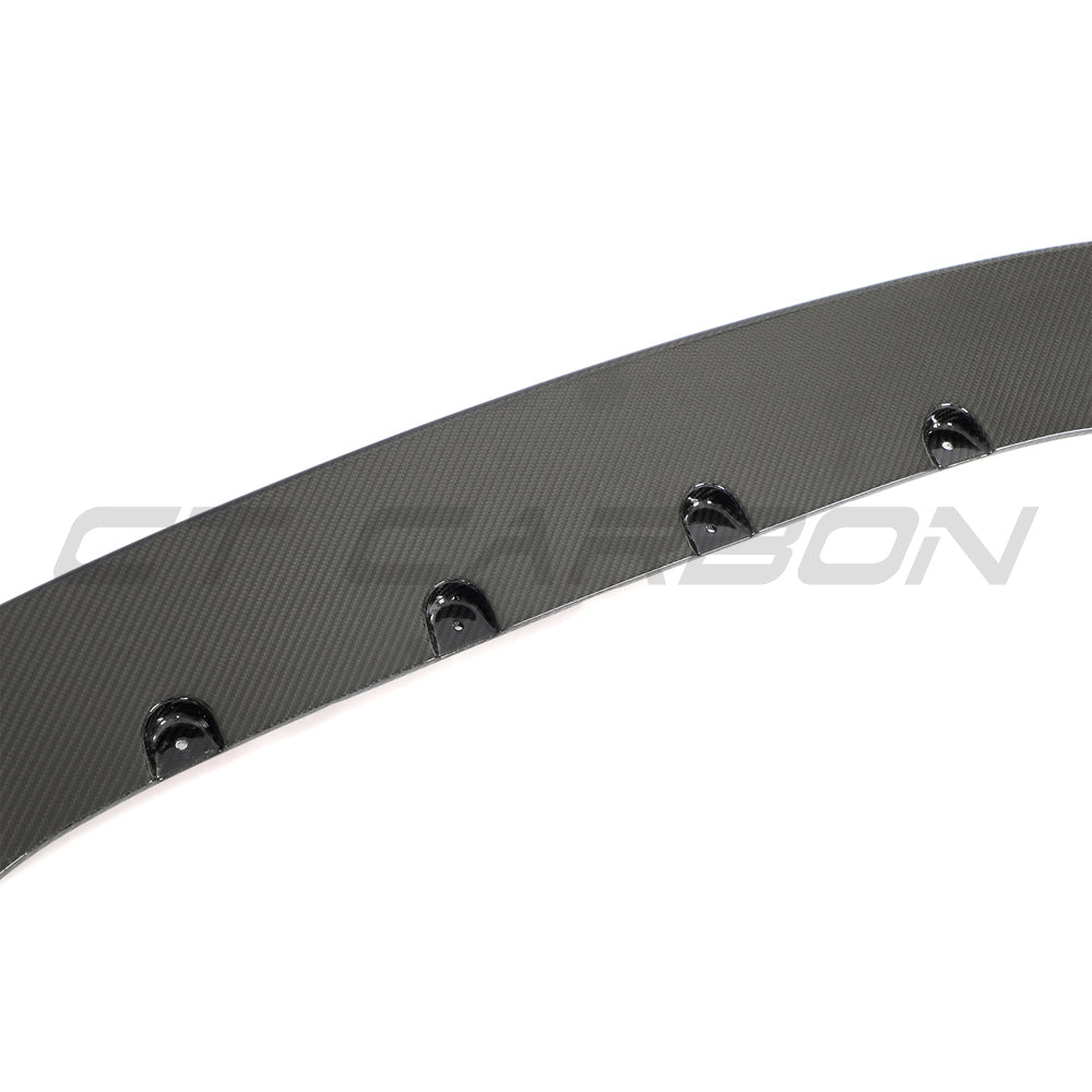 BMW G87 M2 full carbon fibre kit by CT Carbon, including hood, roof, and side panels, showcasing sleek carbon fiber finish.