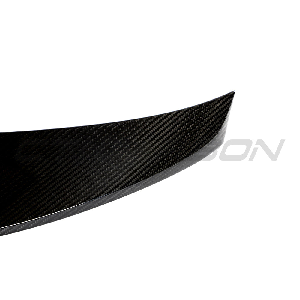 BMW G87 M2 full carbon fiber kit by CT Design, featuring lightweight, high-performance carbon fiber components on a sleek car.