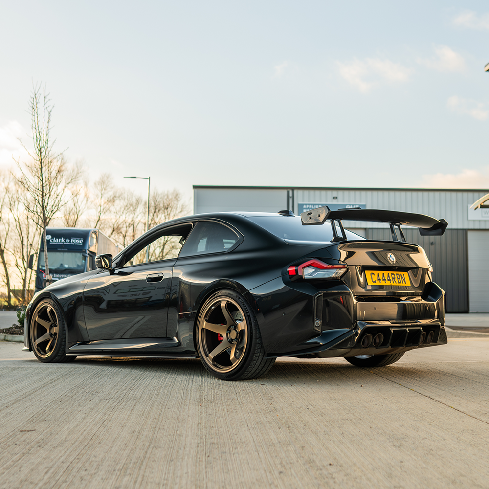 BMW G87 M2 and G42 2 Series Carbon Fibre Swan Neck Wing Spoiler by CT Carbon, showing the sleek aerodynamic design