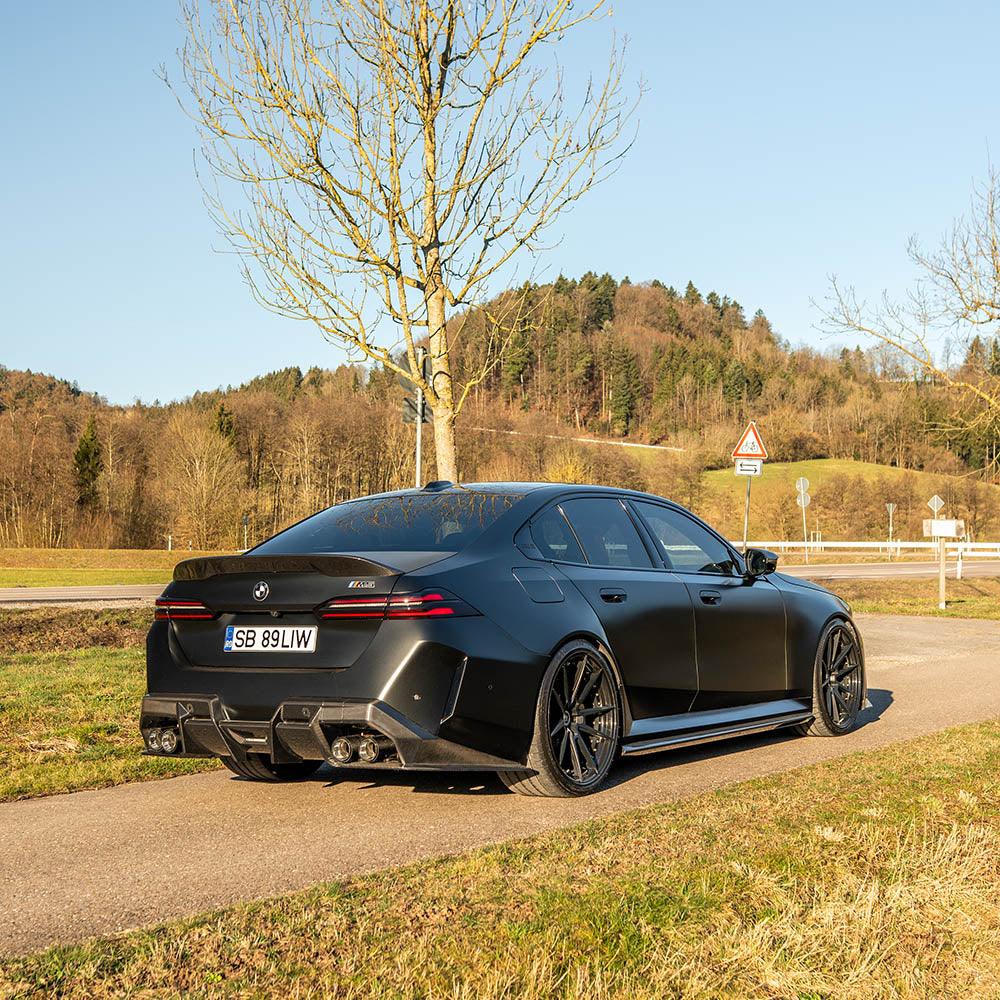 BMW G90 M5 and G99 M5 Touring 2024 carbon fibre diffuser by CT Design, showcasing sleek aerodynamic design and high-quality carbon fiber material.