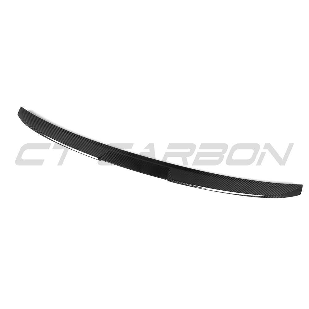 BMW G60 5 Series carbon fibre kit by CT Carbon, featuring a sleek full carbon fibre spoiler for the 2023 model.