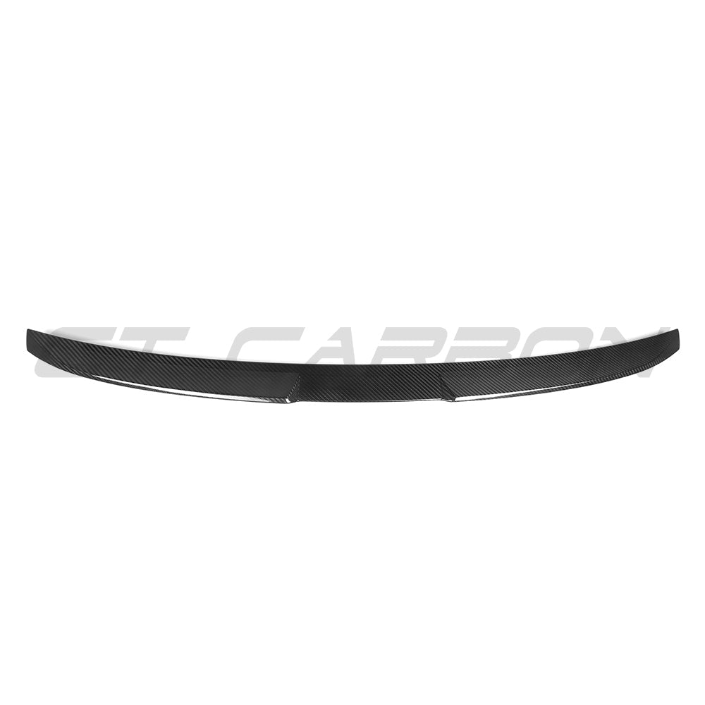 BMW G60 5 Series and I5 carbon fibre kit by CT Carbon, featuring a sleek carbon fibre spoiler and exterior enhancements.