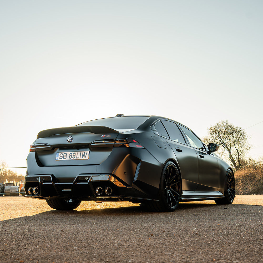 BMW G90 G99 M5 2024 carbon fiber diffuser by CT Design, showcasing sleek, lightweight aerodynamic design for high-performance vehicles.
