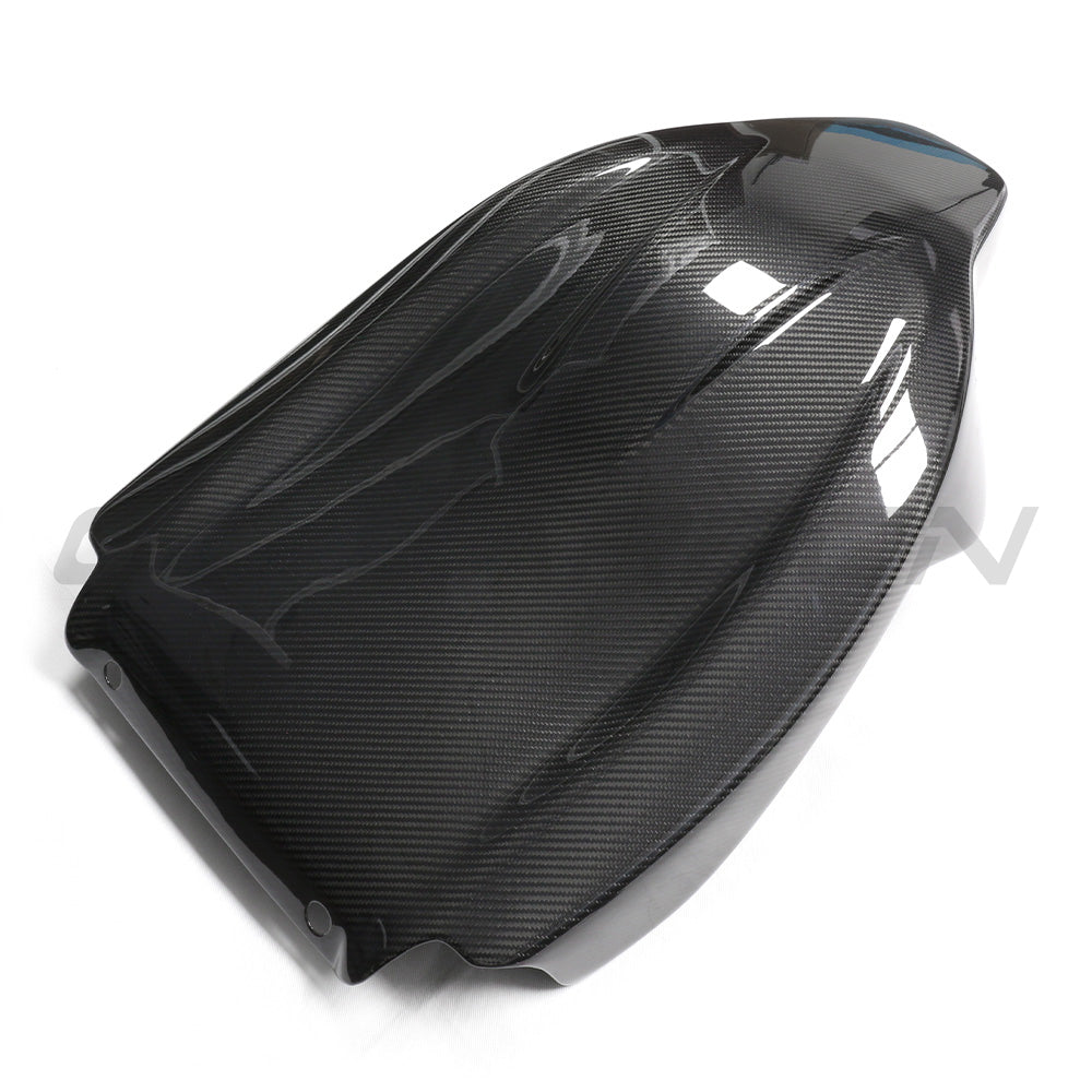 BMW GXX/F9X carbon fiber seat backs by CT Carbon, showcasing lightweight, glossy carbon fiber material for a sleek interior upgrade.