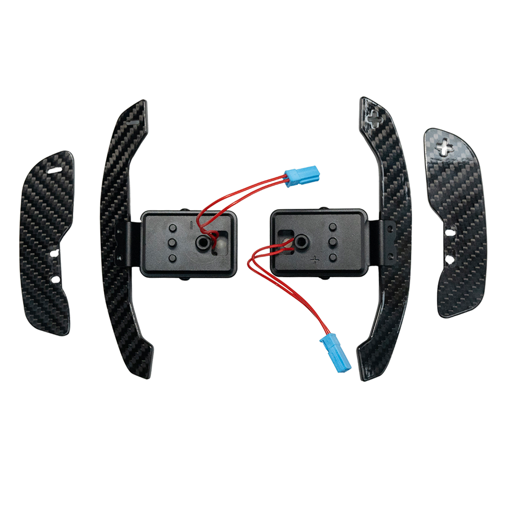 BMW Gxx carbon fiber magnetic shifter paddles by CT Carbon, showing sleek, lightweight design with textured carbon fiber surface.