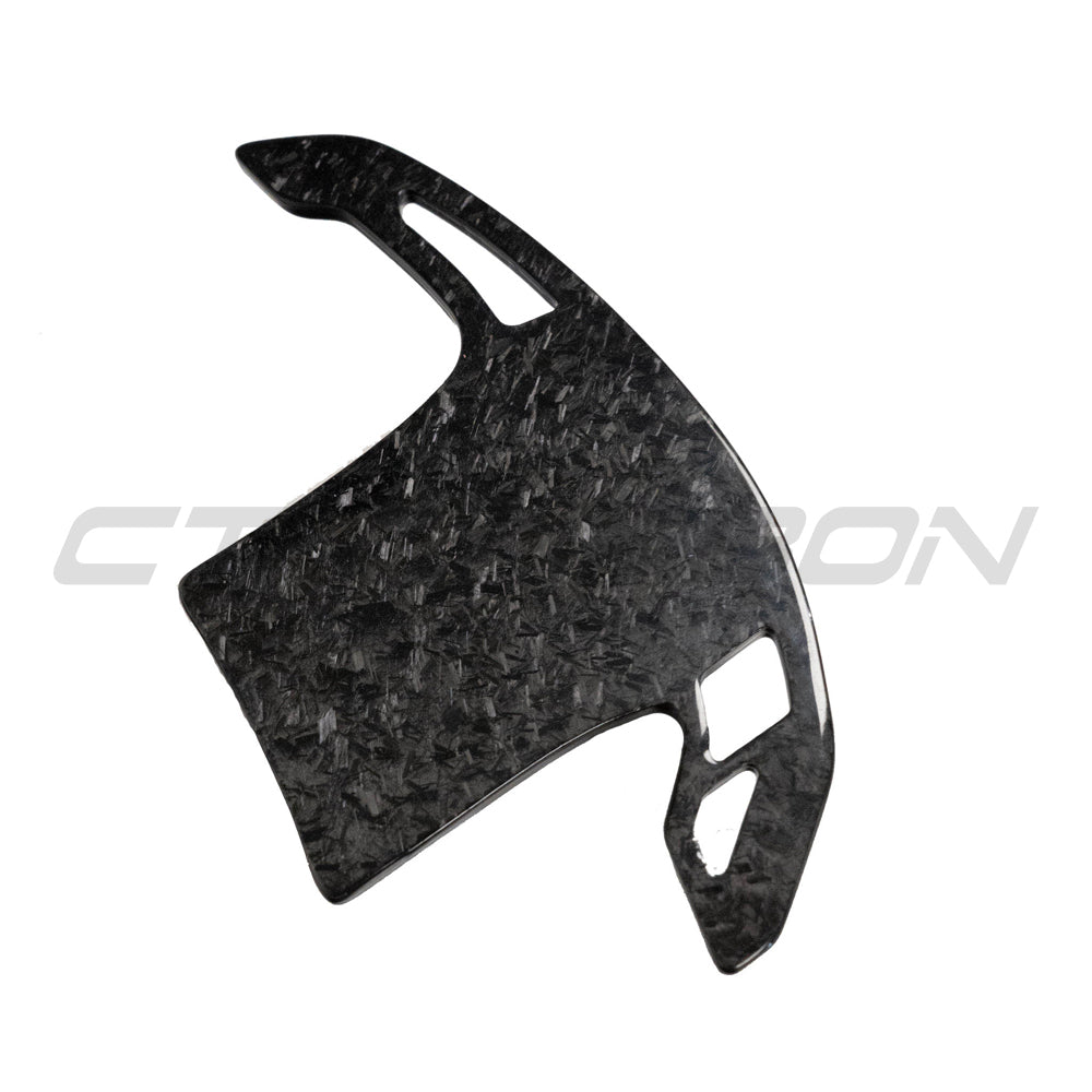 BMW Gxx forged carbon fibre shifter paddles, high-quality accessories by CT Carbon with sleek forged carbon design.