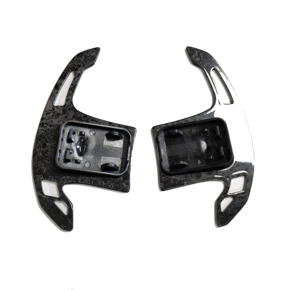 BMW Gxx forged carbon fiber shifter paddles by CT Carbon, lightweight racing-style automotive accessories with a sleek carbon finish.