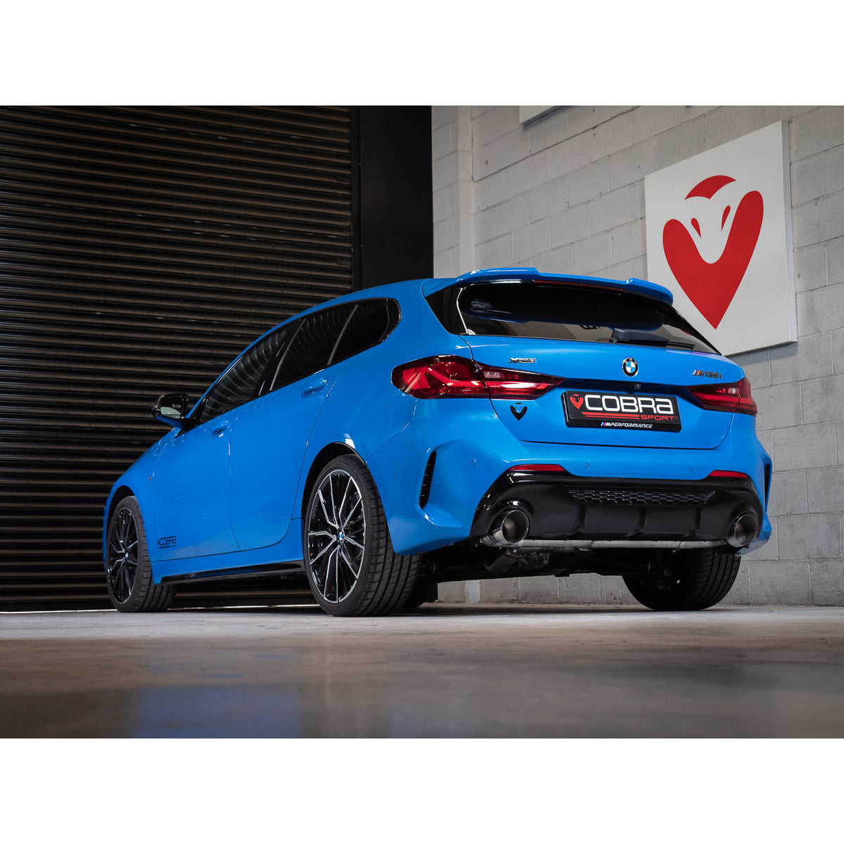 Cobra Sport BMW M135i F40 Venom Cat Back Race Box Delete Performance Exhaust, showcasing the sleek exhaust system with polished tips.