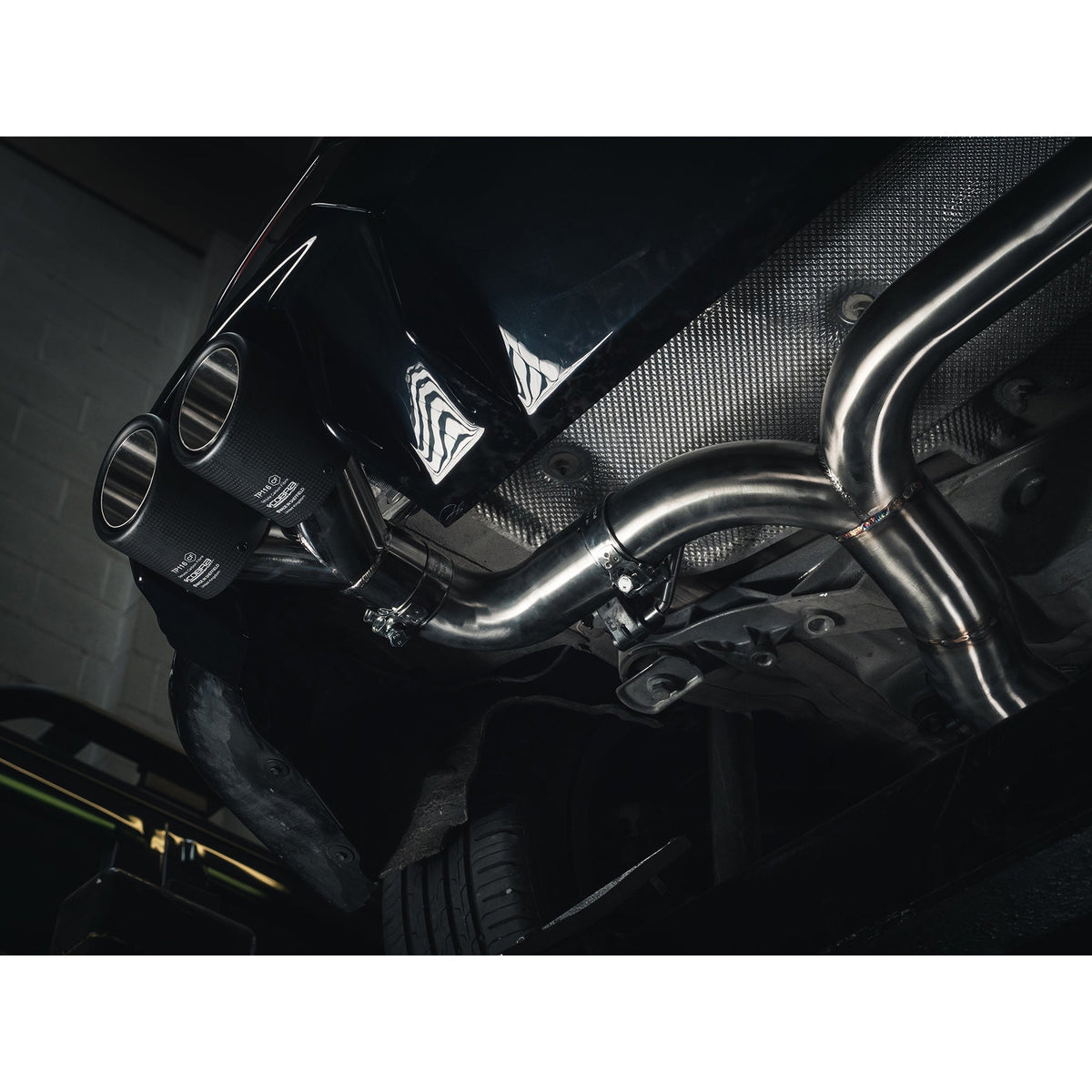Cobra Sport BMW M135i F40 quad exit GPF/OPF back exhaust with race box delete, showcasing the performance exhaust system.
