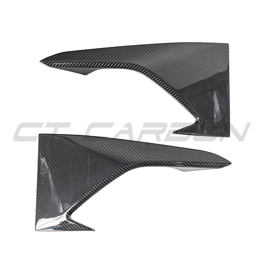 BMW M2 F87 N55 carbon fibre front bumper corners by CT Carbon, showcasing sleek, lightweight automotive accessories.
