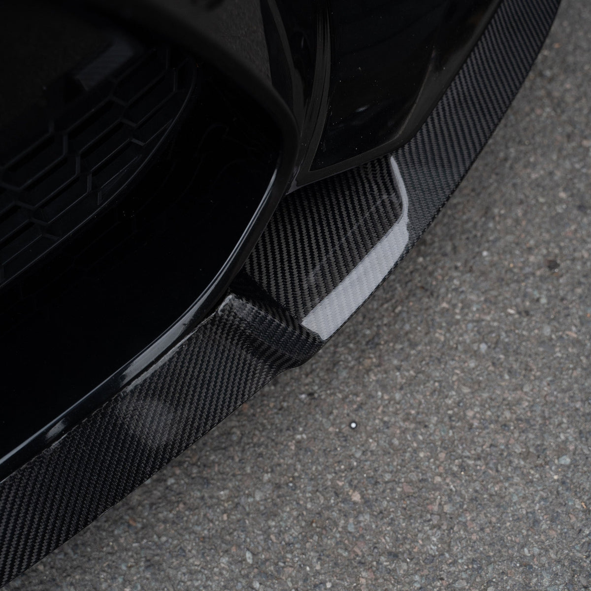 BMW M2 F87 N55 carbon fiber splitter V2 by CT Carbon, featuring M4 CS style design on the front bumper.