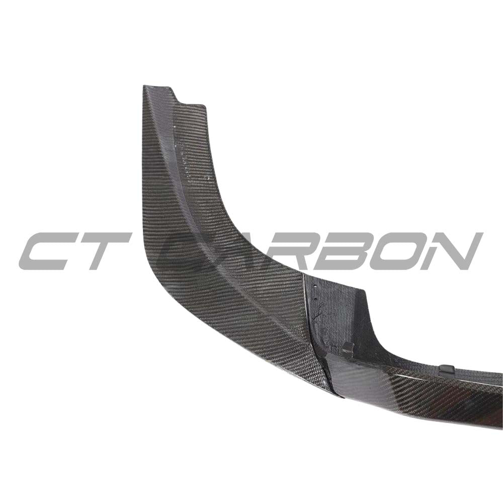 BMW M2 F87 carbon fibre diffuser by CT Carbon, V3 style, showcasing sleek aerodynamic design and high-quality carbon fiber material.