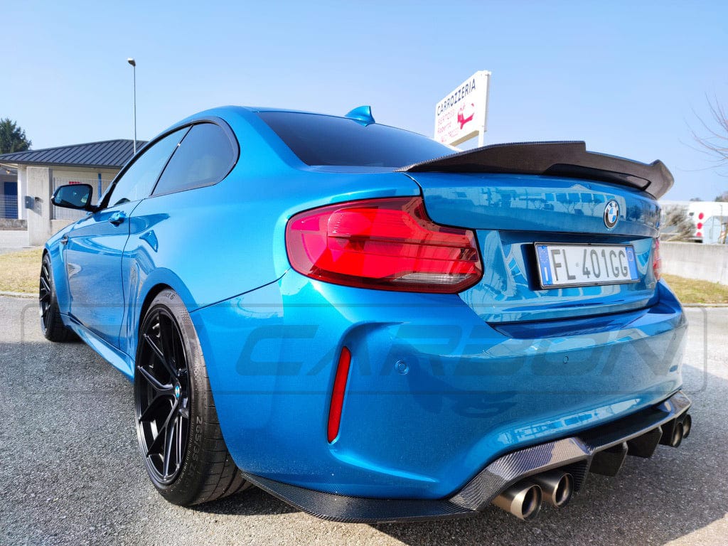 BMW M2 F87 carbon fiber diffuser by CT Carbon, V3 style, showcasing lightweight aerodynamic design for performance and style.
